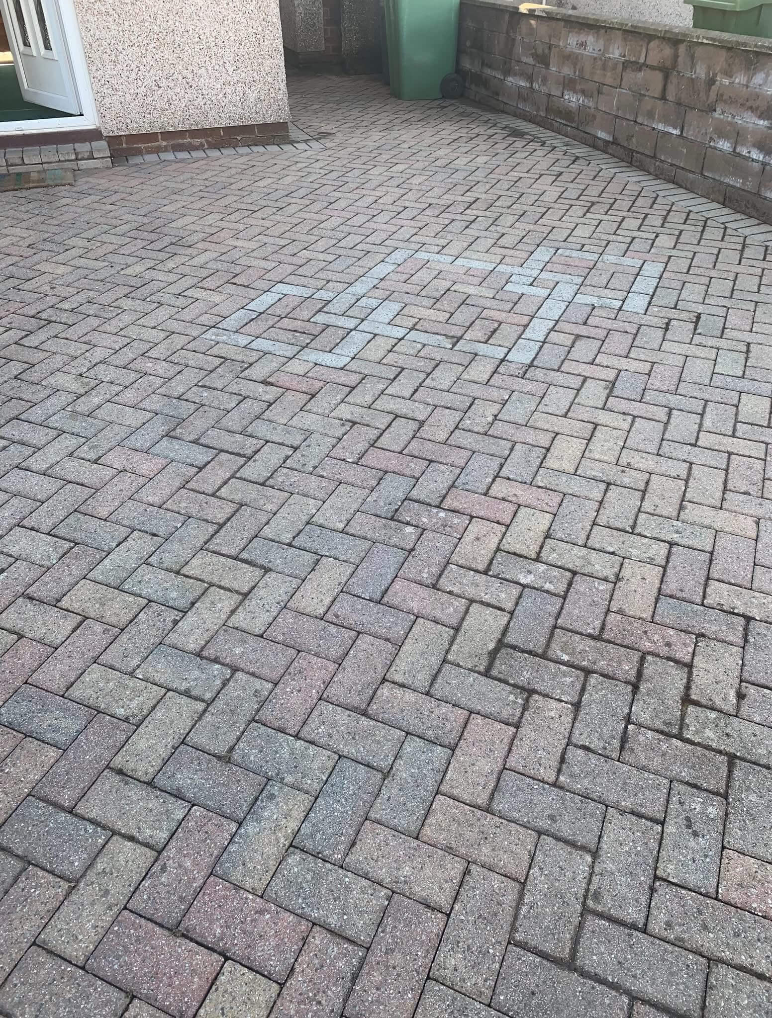 Driveway after professional pressure washing in Cardiff